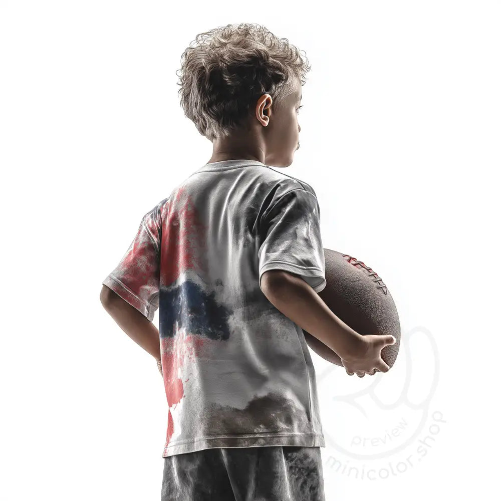Boy holding football seen from behind Printable Poster